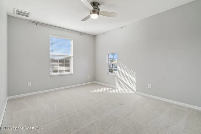 a bathroom with a double vanity sink a mirror and shower