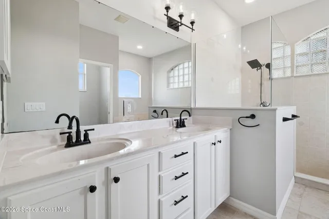 a white bath tub sitting in a bathroom