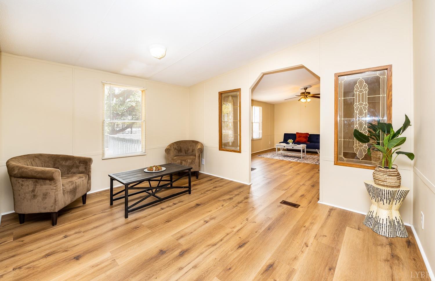 5893 Red House Road Appomattox, VA 24522 - Photo 21 of 28 a living room with furniture and wooden floor