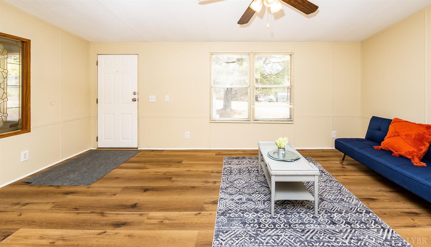 5893 Red House Road Appomattox, VA 24522 - Photo 23 of 28 a living room with couch and a window