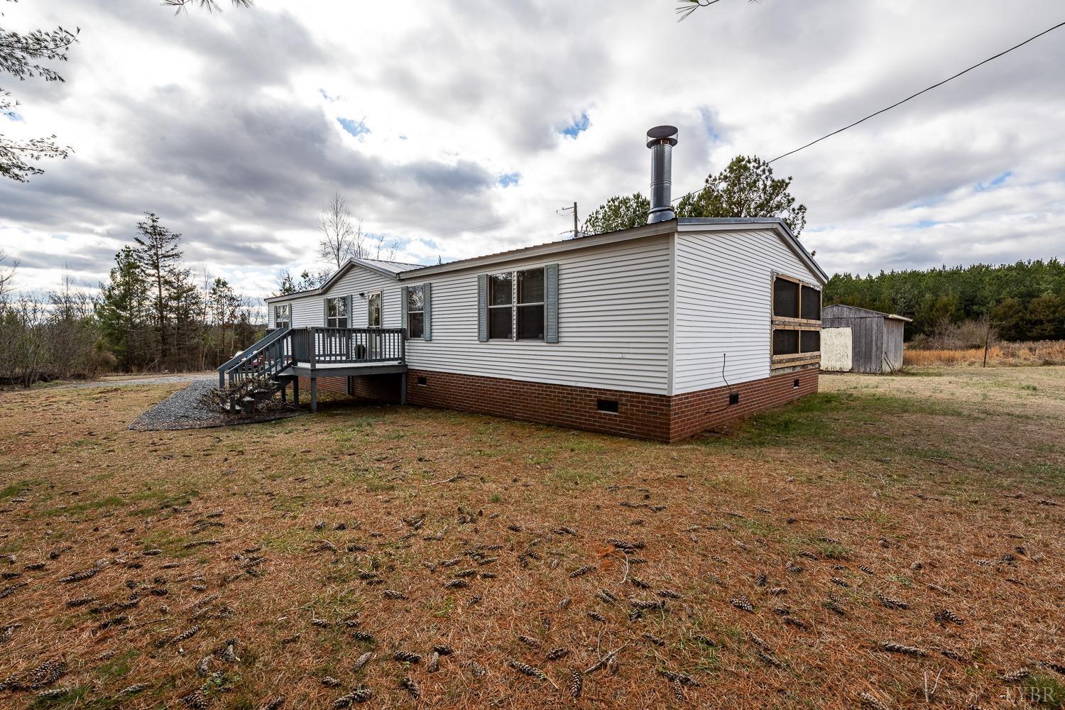 5893 Red House Road Appomattox, VA 24522 - Photo 28 of 28 a view of a house with a yard