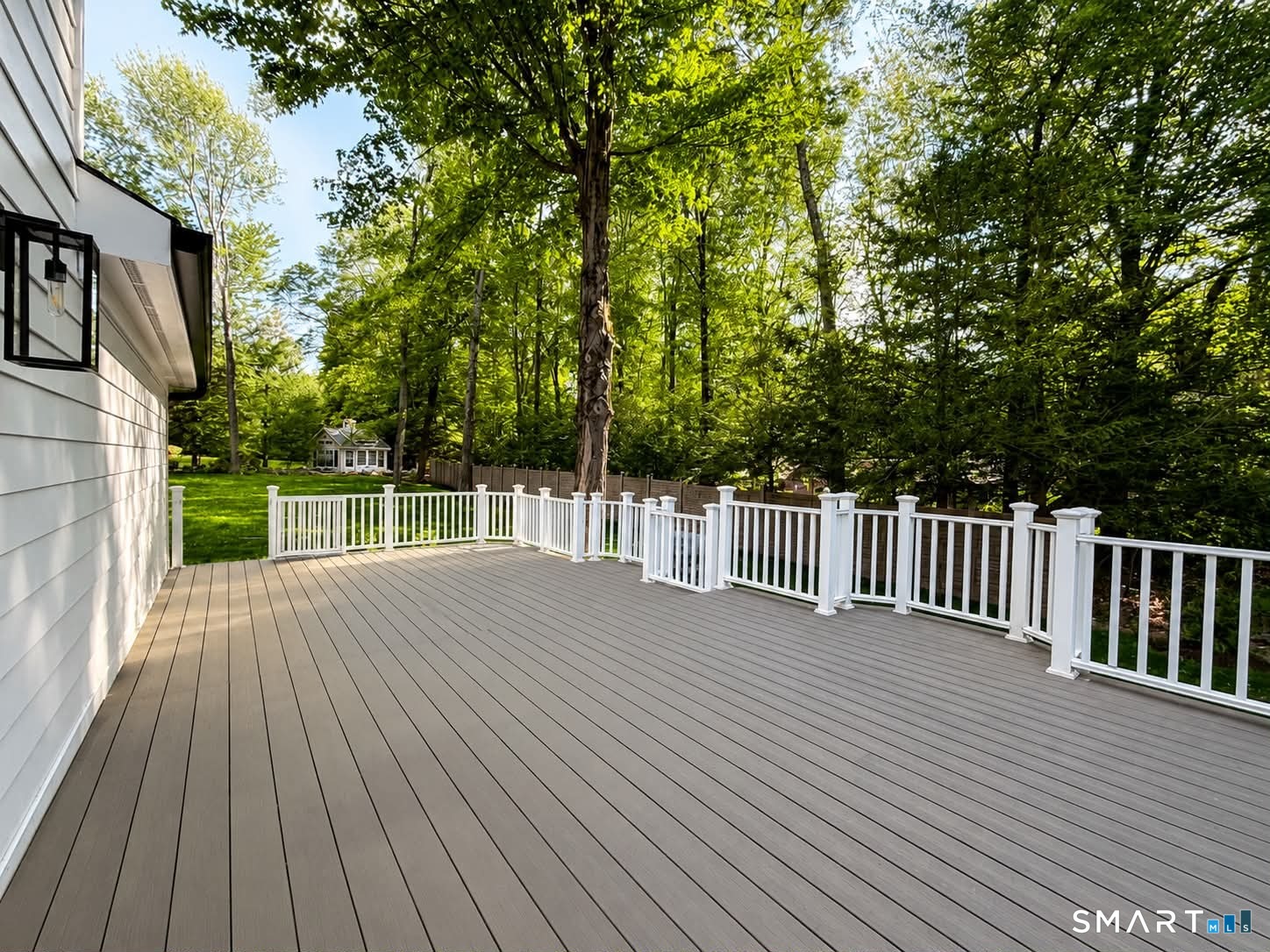 29 Flint Rock Road Stamford, CT 06903 - Photo 32 of 34 Maintenance-free deck. Fiber cement Hardie siding, PVC trim/handrails/balusters, composite decking.