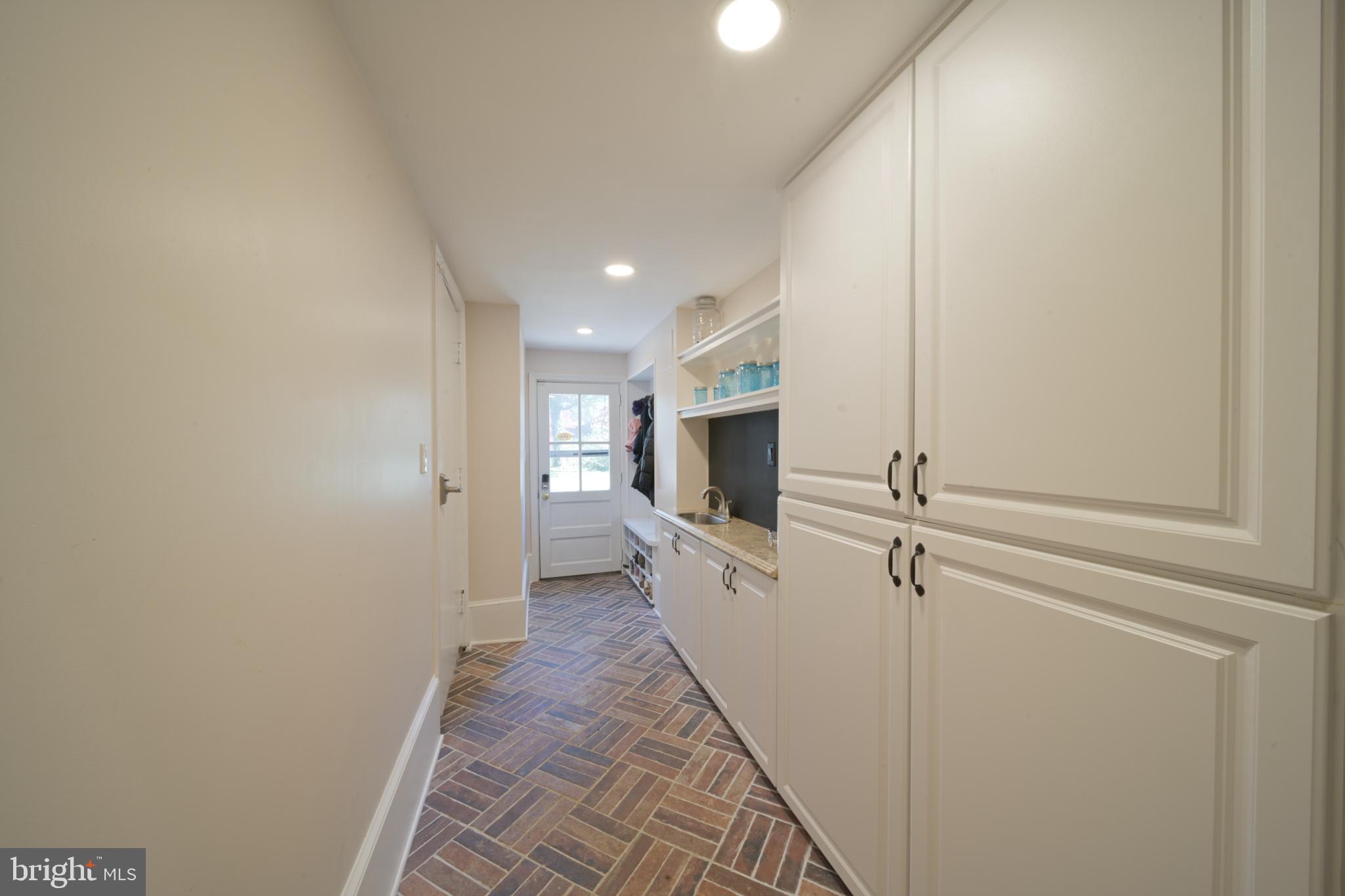 1105 Kingsley Road Jenkintown, PA 19046 - Photo 31 of 39 Lower level mud room, wet bar & storage