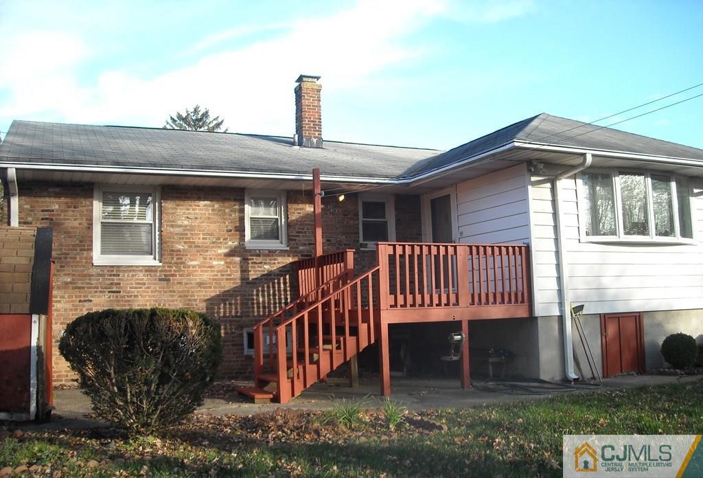 18 Gurley Road Edison, NJ 08817 - Photo 2 of 14 a front view of a house with a porch