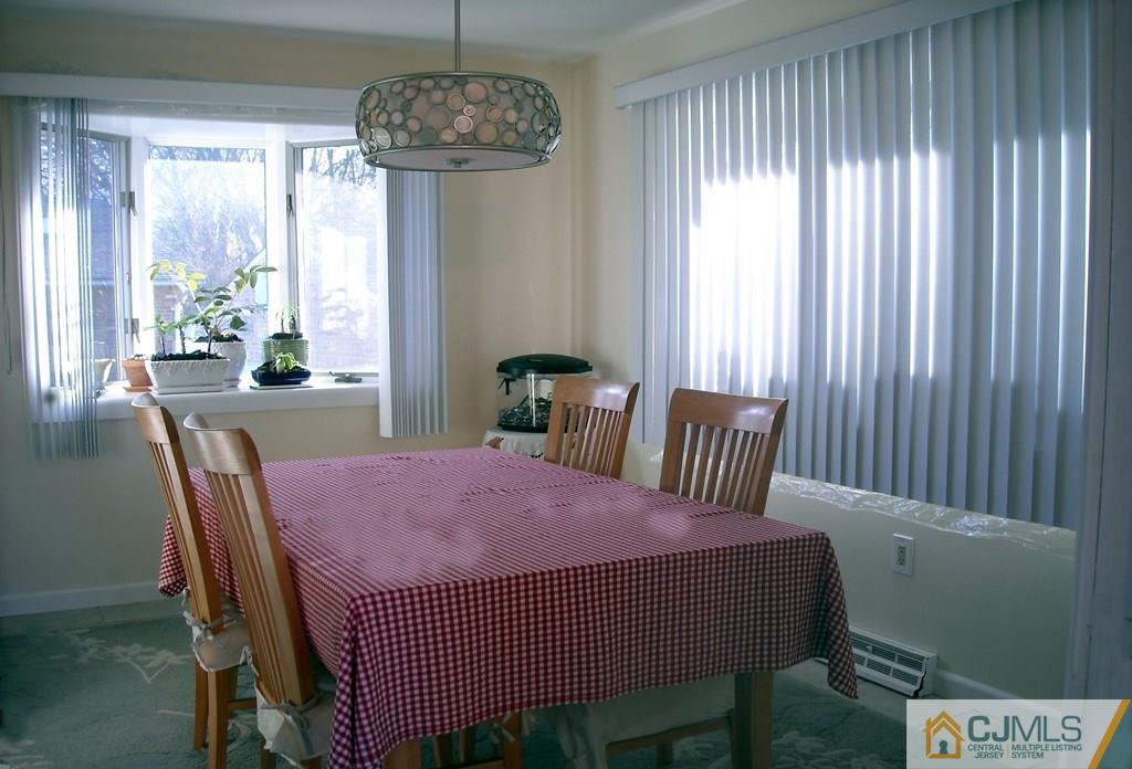 18 Gurley Road Edison, NJ 08817 - Photo 3 of 14 a view of a dining room with furniture window and outside view