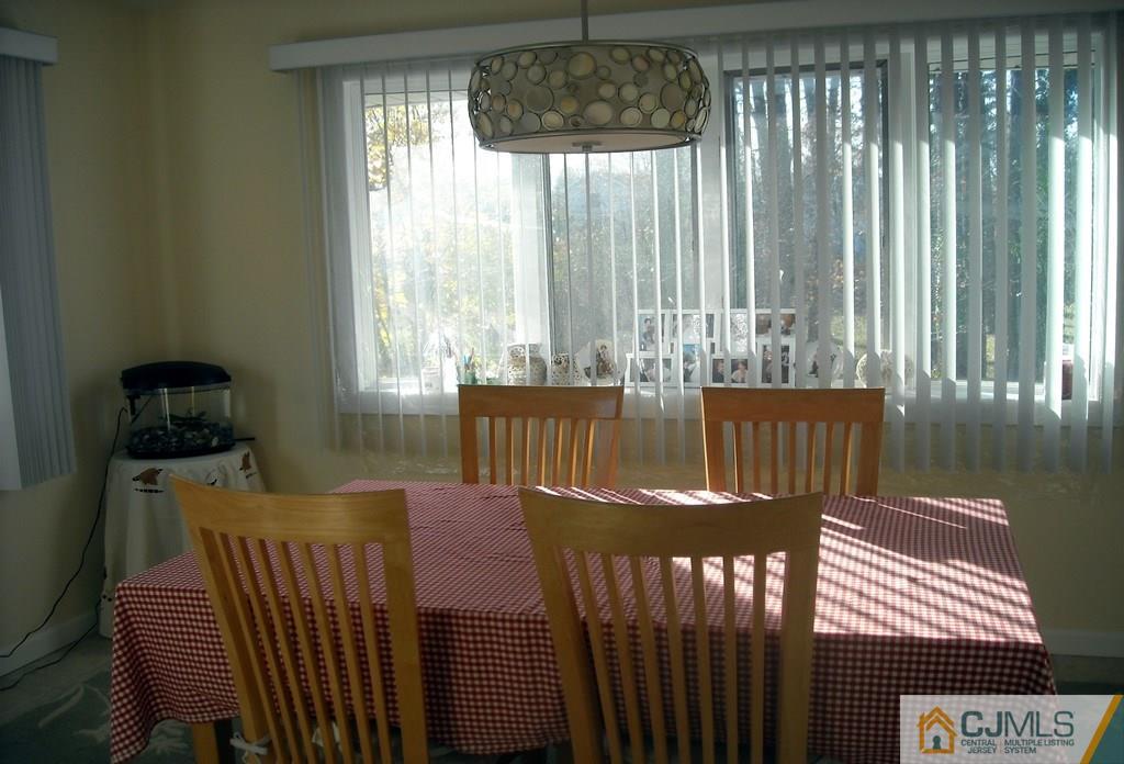 18 Gurley Road Edison, NJ 08817 - Photo 4 of 14 a living room with furniture and a large window