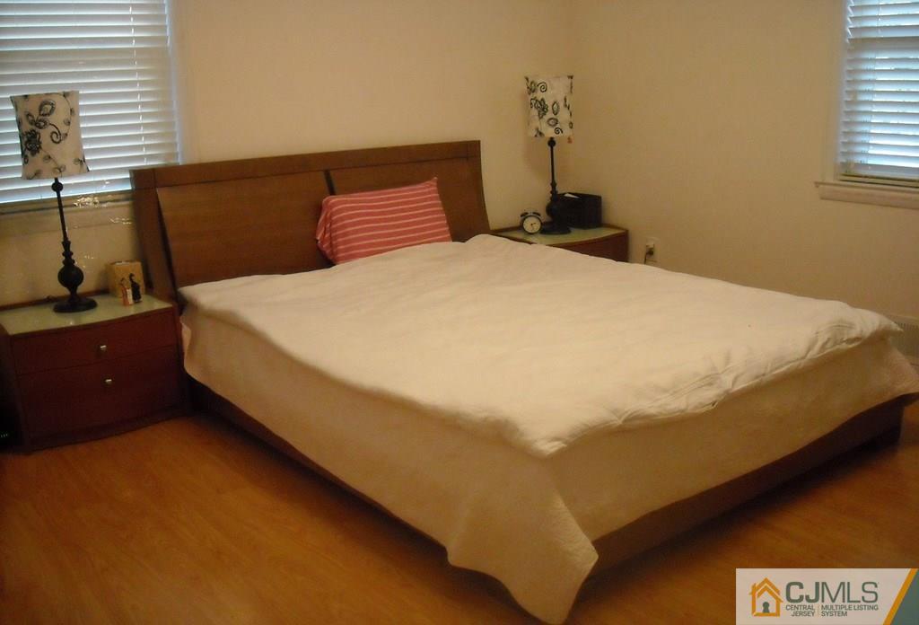 18 Gurley Road Edison, NJ 08817 - Photo 8 of 14 a bedroom with a bed and window