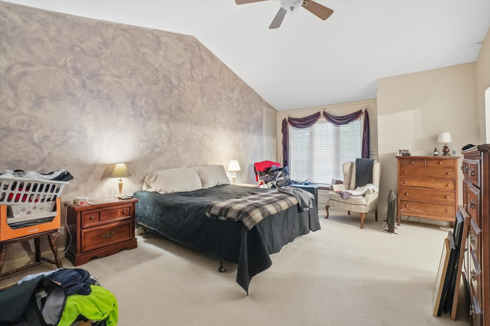 821 Killarney Pass Circle Mundelein, IL 60060 - Photo 11 of 32 a bedroom with bed and a chandelier