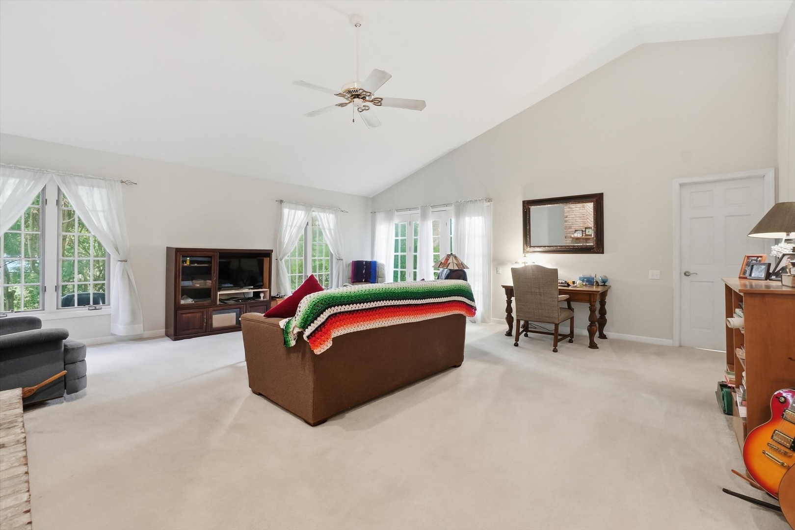 821 Killarney Pass Circle Mundelein, IL 60060 - Photo 6 of 32 a living room with furniture and a flat screen tv