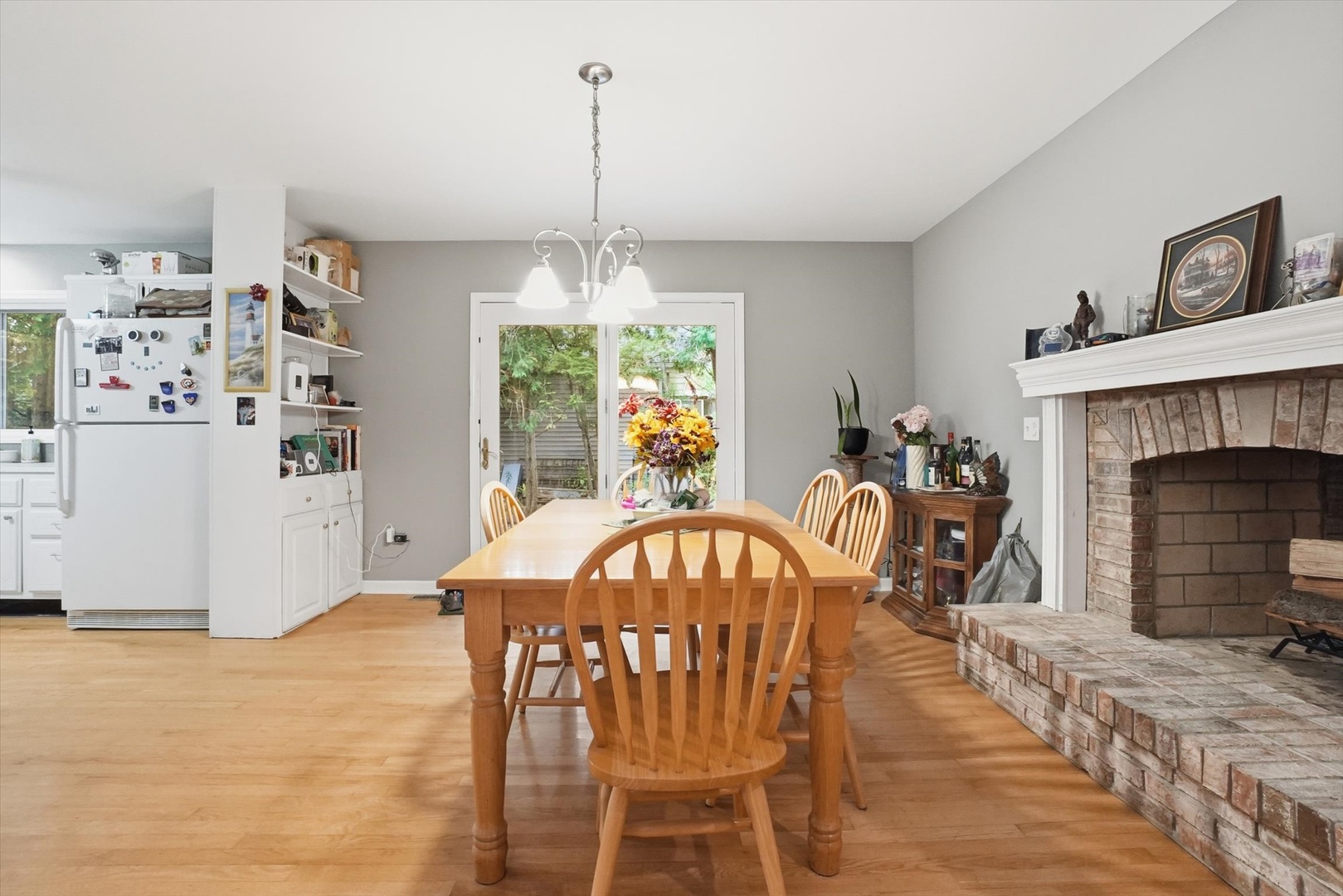 821 Killarney Pass Circle Mundelein, IL 60060 - Photo 8 of 32 a view of a dining room with furniture and chandelier