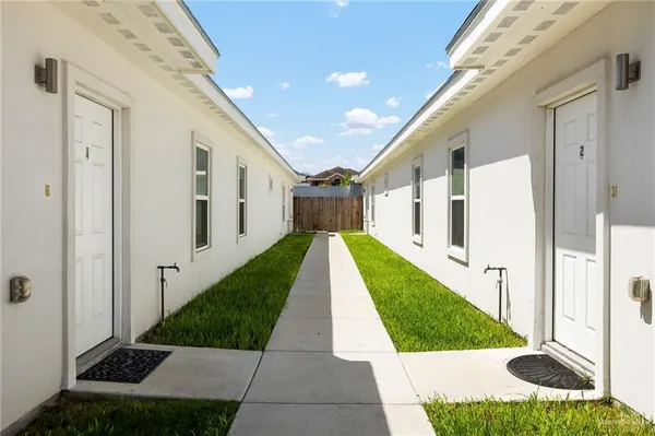 a view of a back yard of the house
