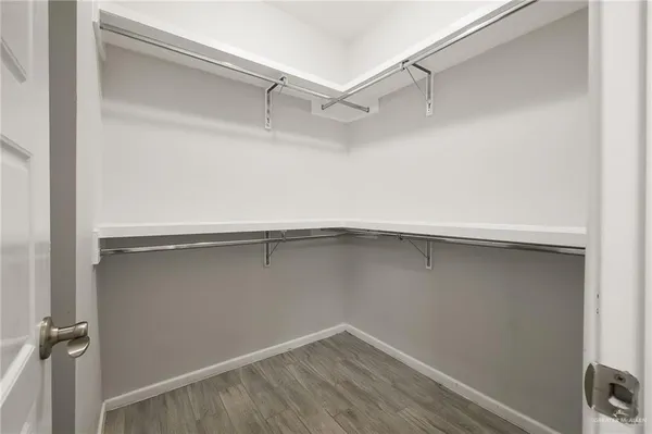 a view of an empty walk in closet