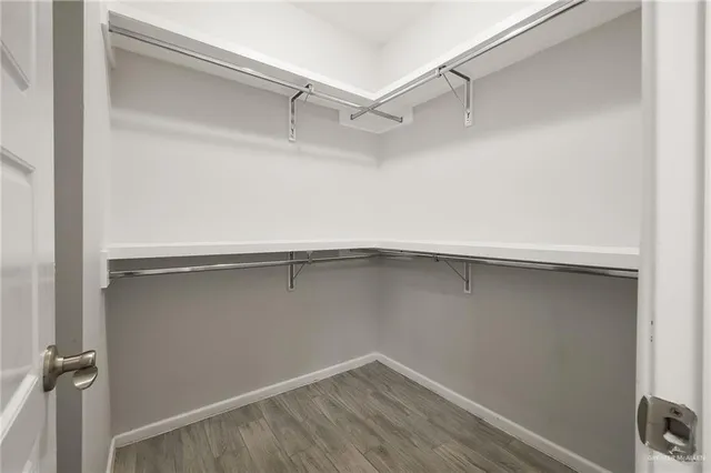 a view of an empty walk in closet
