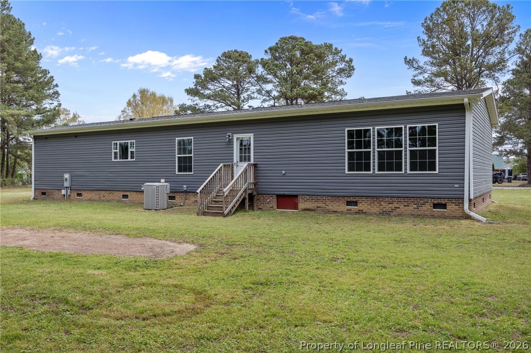 2252 Old Stage Road South Erwin, NC 28339 - Photo 35 of 47 a front view of a house with garden