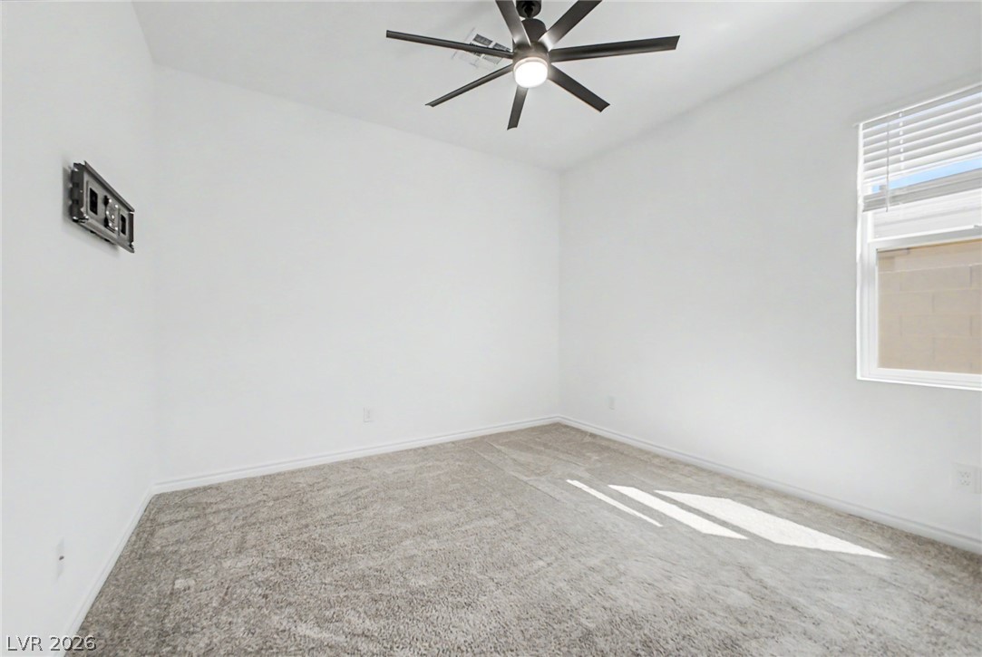 226 Augusta Ridge Henderson, NV 89015 - Photo 18 of 47 Bright and airy, this room provides a blank canvas for personalization.