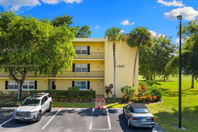 a car parked in front of a house
