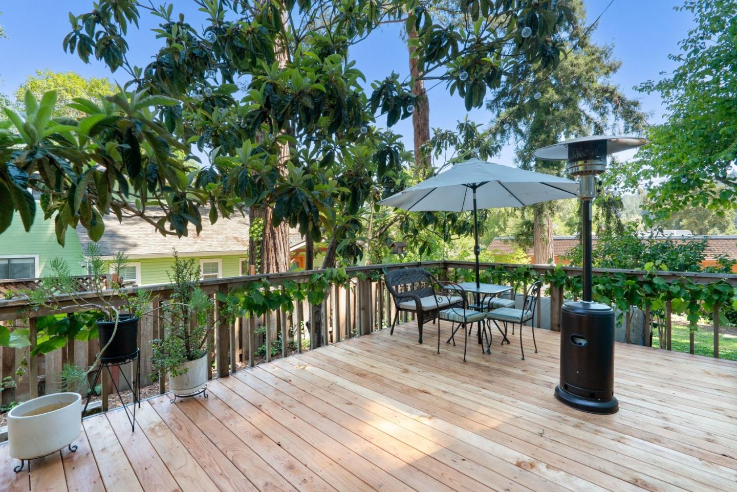 280 Main Street Ben Lomond, CA 95005 - Photo 41 of 47 a view of a chairs and table on the wooden floor