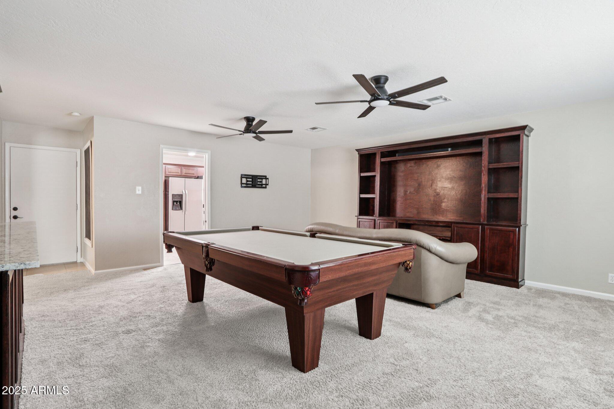 127 East Garfield Street Tempe, AZ 85288 - Photo 13 of 60 a room with pool table and windows