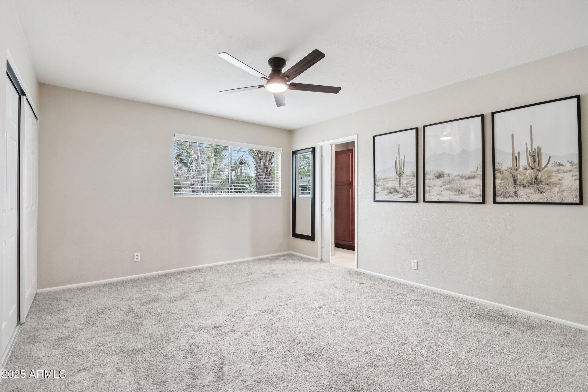 127 East Garfield Street Tempe, AZ 85288 - Photo 16 of 60 a view of an empty room with a window