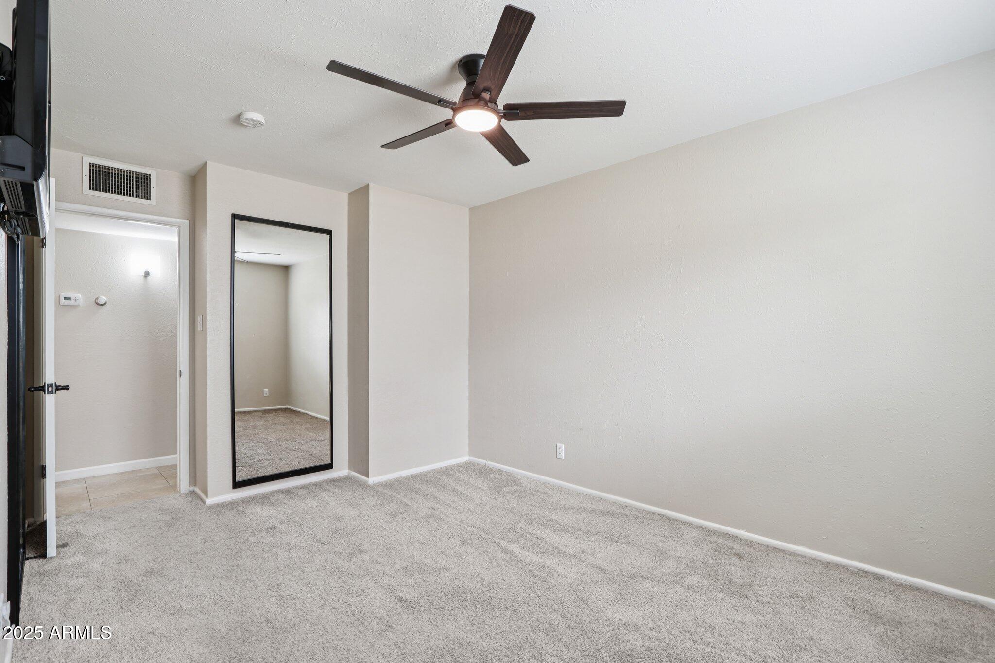 127 East Garfield Street Tempe, AZ 85288 - Photo 24 of 60 a view of a livingroom with a ceiling fan