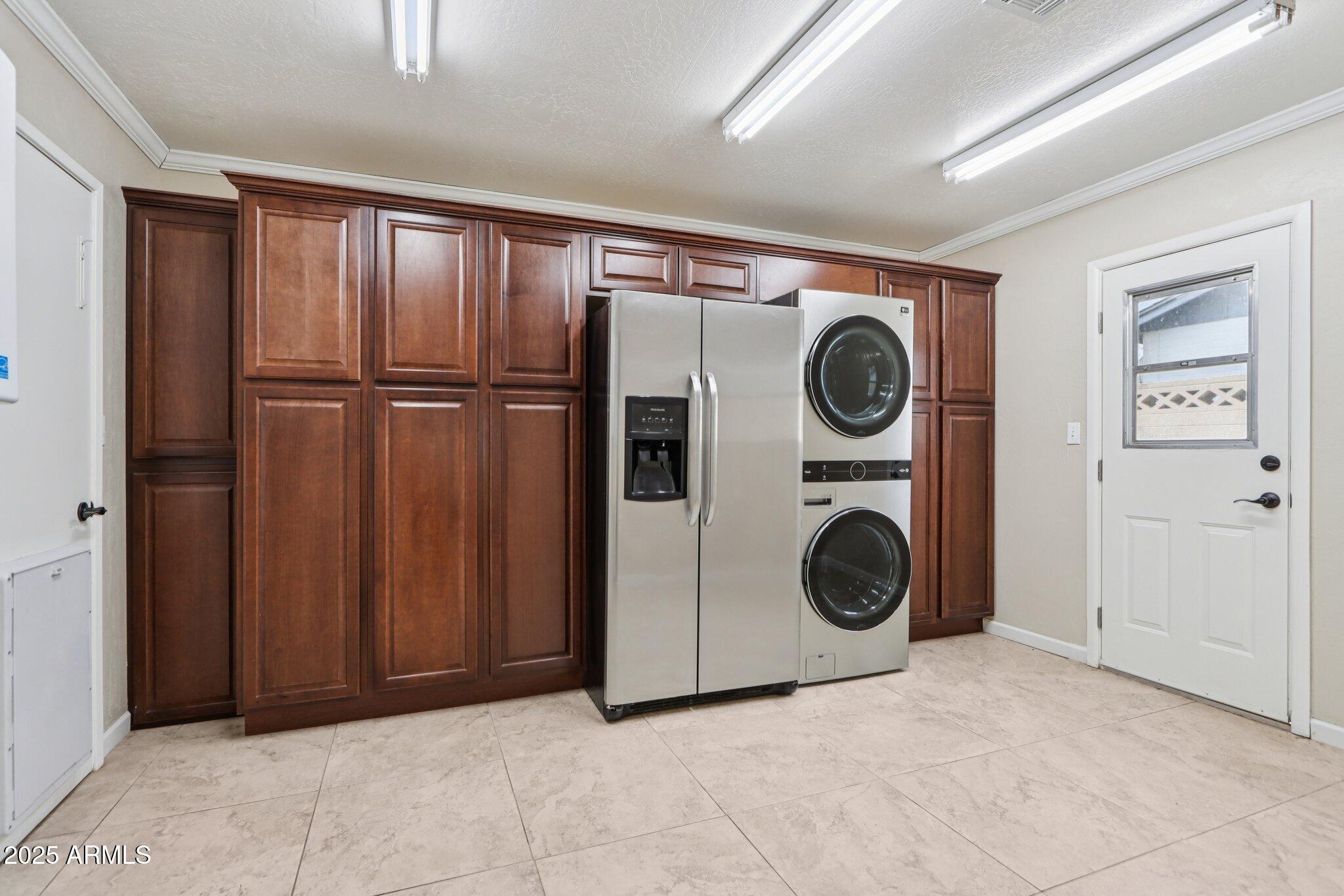 127 East Garfield Street Tempe, AZ 85288 - Photo 26 of 60 a view of a storage & utility room with washer and dryer