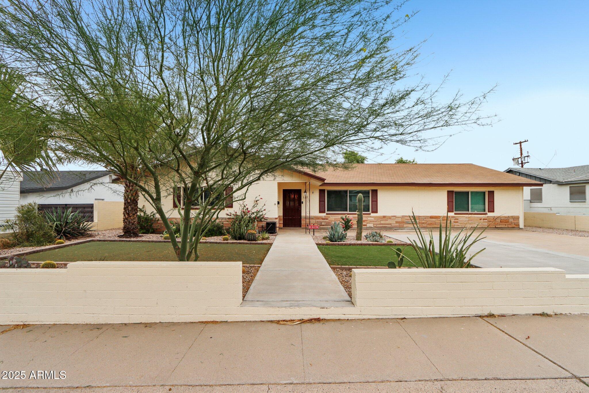 127 East Garfield Street Tempe, AZ 85288 - Photo 31 of 60 a view of house with yard