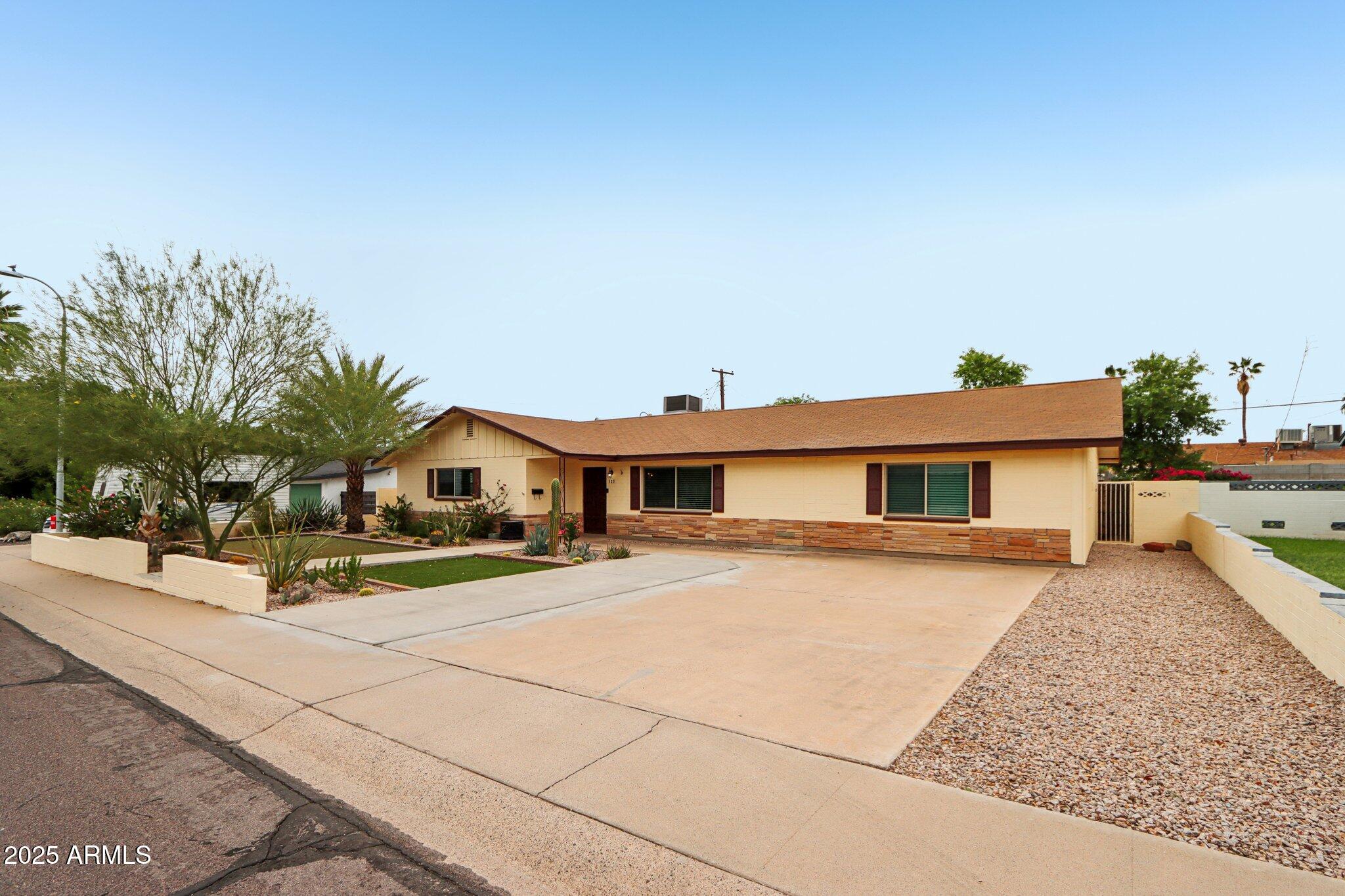 127 East Garfield Street Tempe, AZ 85288 - Photo 36 of 60 a house view with a outdoor space