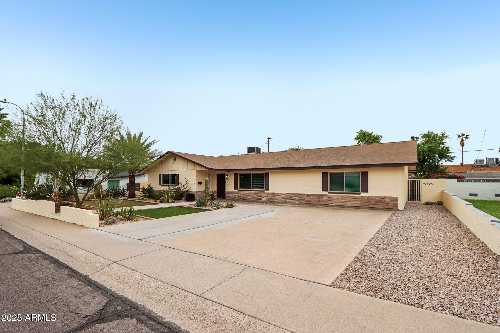 127 East Garfield Street Tempe, AZ 85288 - Photo 37 of 60 a house view with a outdoor space