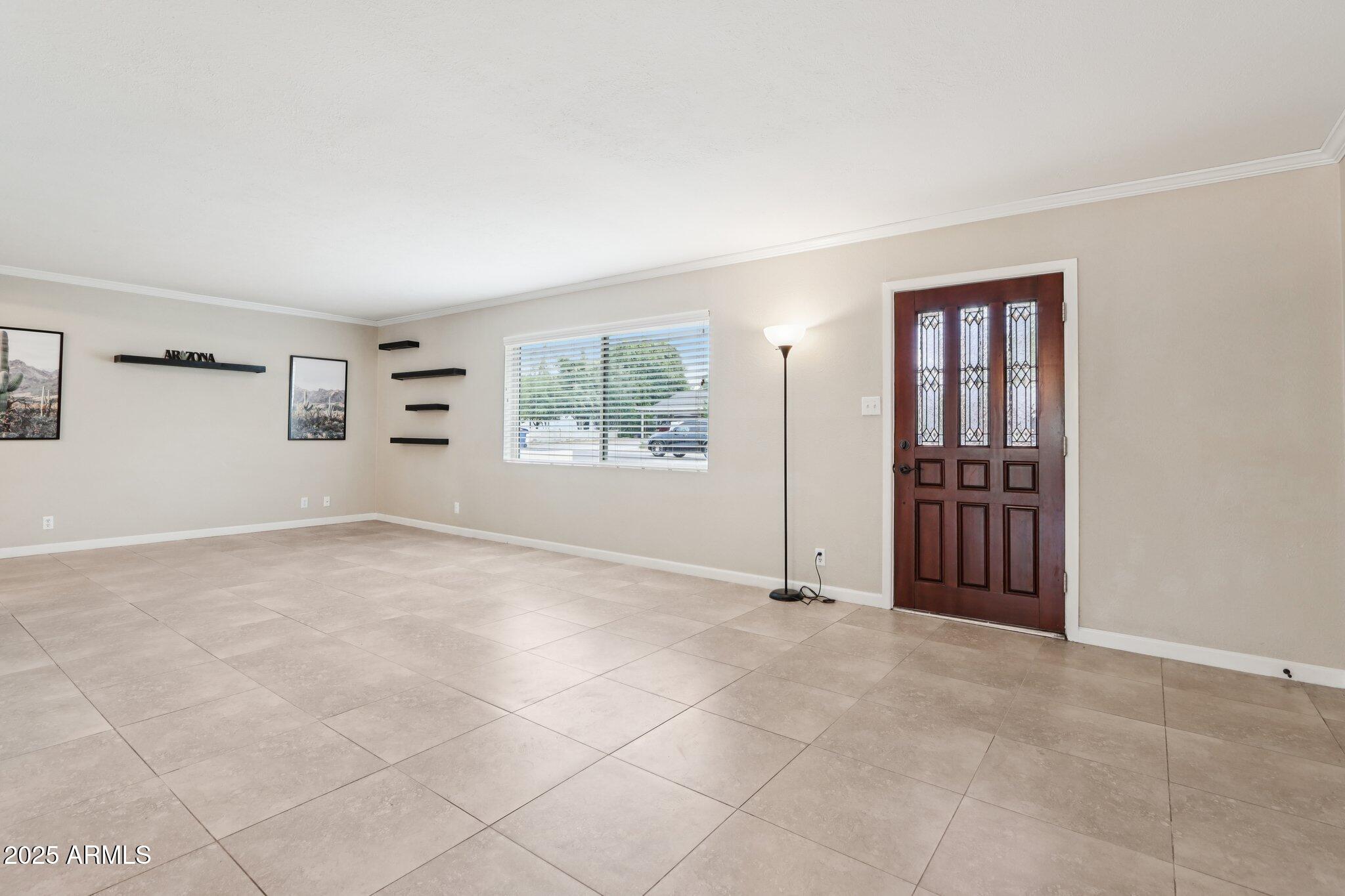 127 East Garfield Street Tempe, AZ 85288 - Photo 7 of 60 an empty room with windows