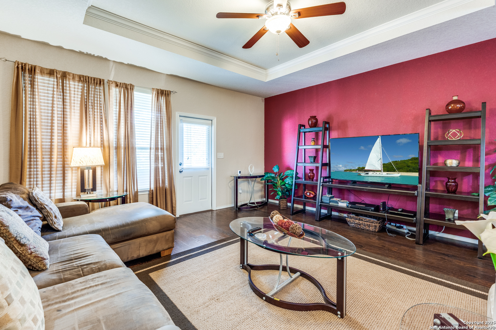 15923 Silver Rose Selma, TX 78154 - Photo 11 of 19 a living room with furniture gym equipment and a large window