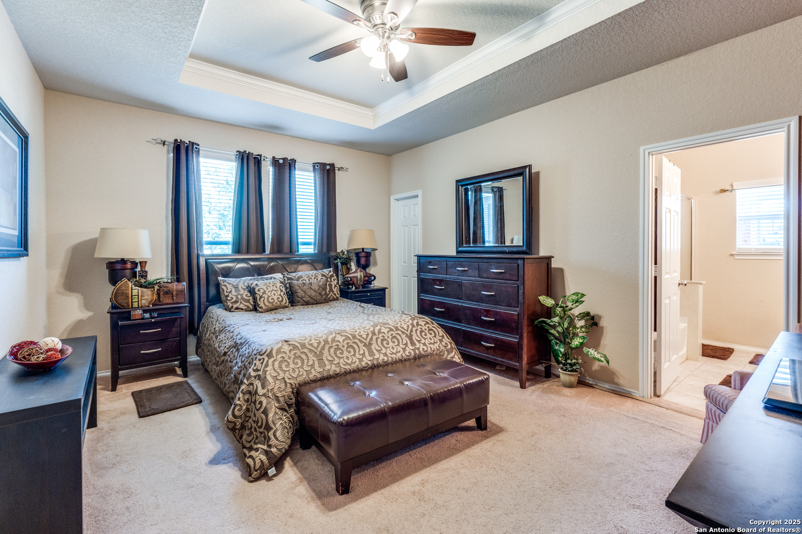 15923 Silver Rose Selma, TX 78154 - Photo 13 of 19 a spacious bedroom with a bed and a dresser