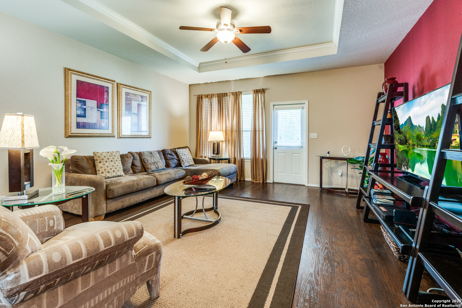 15923 Silver Rose Selma, TX 78154 - Photo 10 of 19 a living room with furniture a flat screen tv and a window