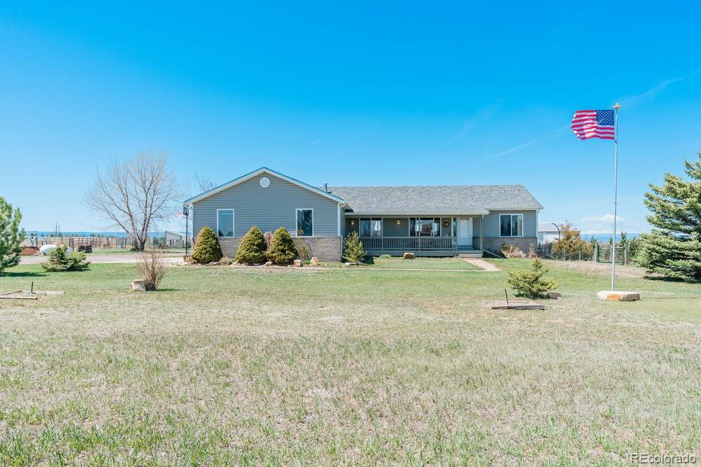 a house view with a garden space