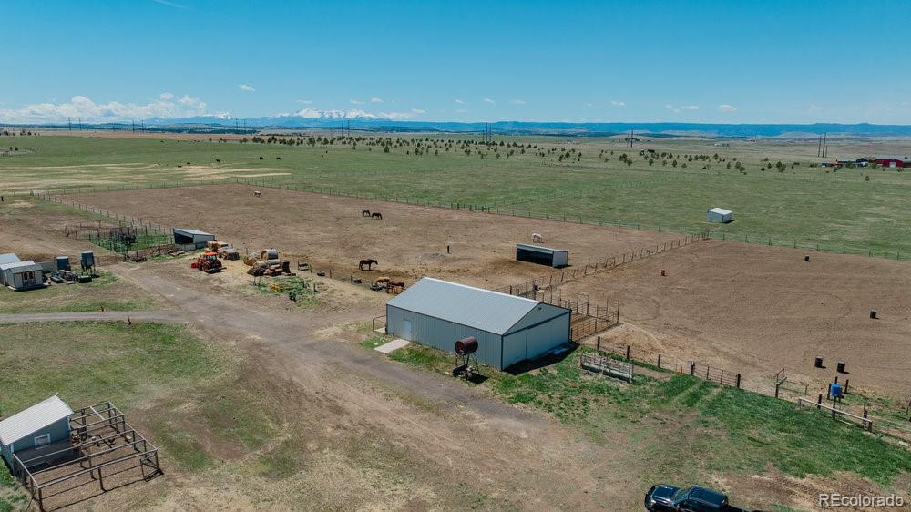 24535 County Road 5 Elbert, CO 80106 - Photo 38 of 45 an aerial view of a houses with outdoor space and seating