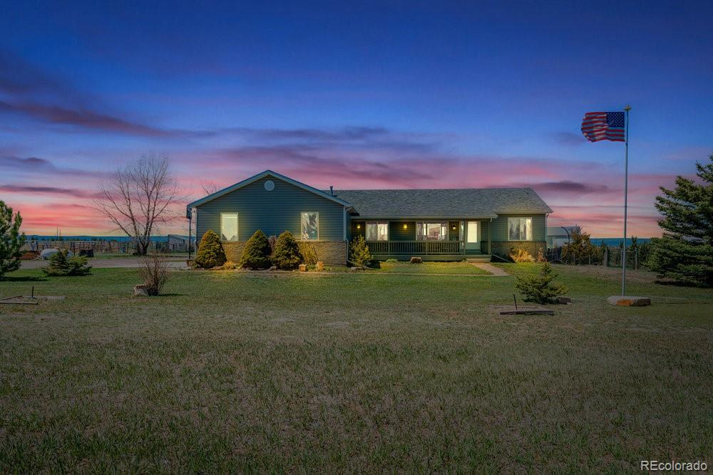 24535 County Road 5 Elbert, CO 80106 - Photo 44 of 45 a front view of a house with a yard