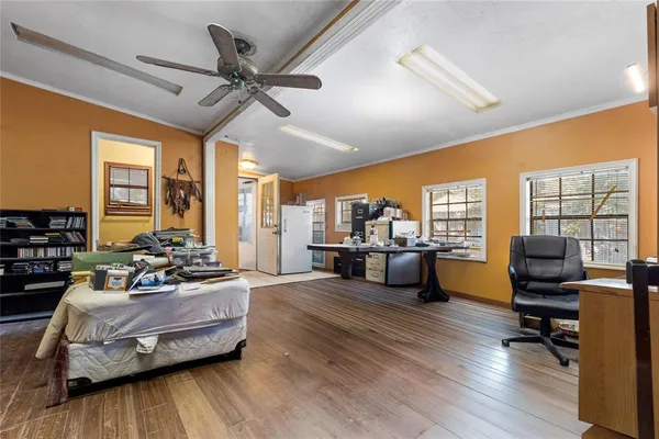 a bathroom with a toilet a sink and a mirror