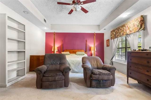 an empty room with a empty space and windows