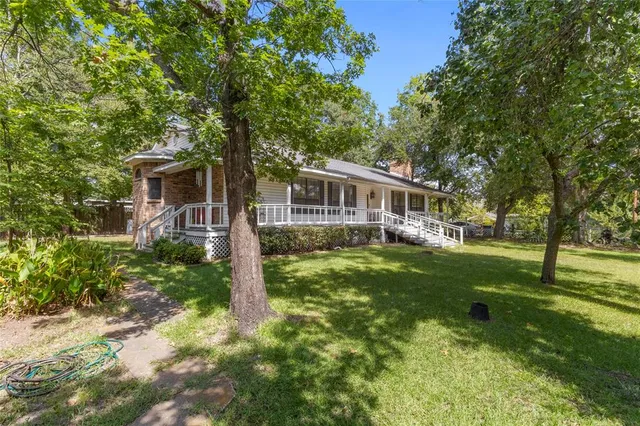 a house view with a garden space