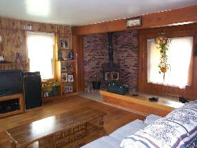 8951 Stillman Valley Road Stillman Valley, IL 61084 - Photo 2 of 5 a bed room with a bed and a television