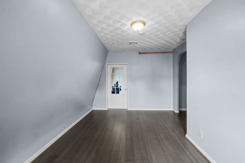 186 John Street Fall River, MA 02721 - Photo 12 of 38 a view of a hallway with wooden floor