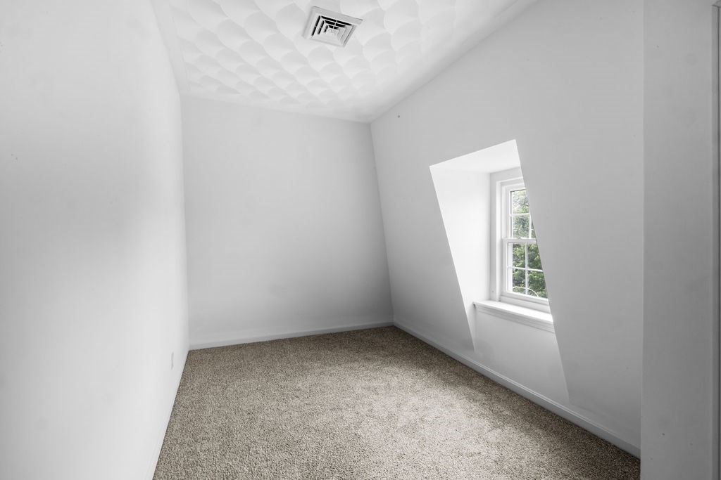 186 John Street Fall River, MA 02721 - Photo 17 of 38 an empty room with a window