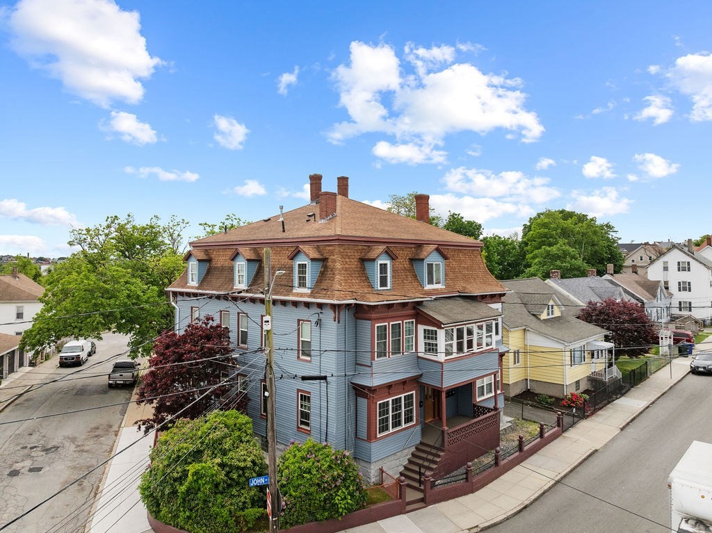 186 John Street Fall River, MA 02721 - Photo 2 of 38 a front view of a house with a yard