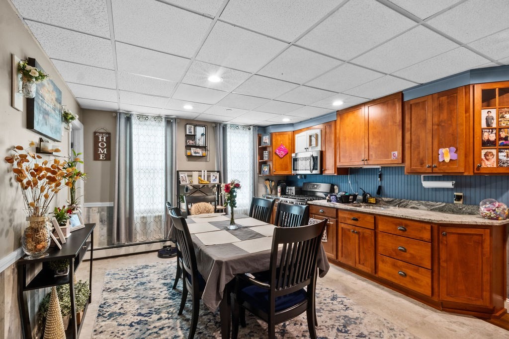 186 John Street Fall River, MA 02721 - Photo 29 of 38 a view of a dining room with furniture window and outside view