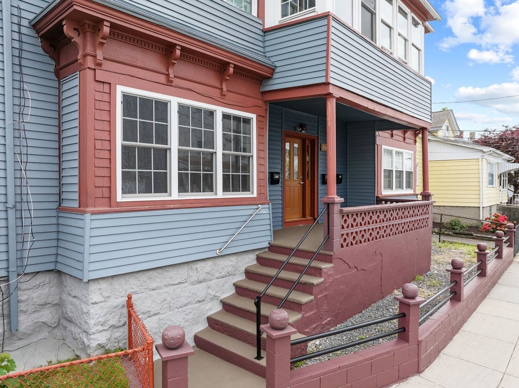 186 John Street Fall River, MA 02721 - Photo 3 of 38 a front view of a house with a porch