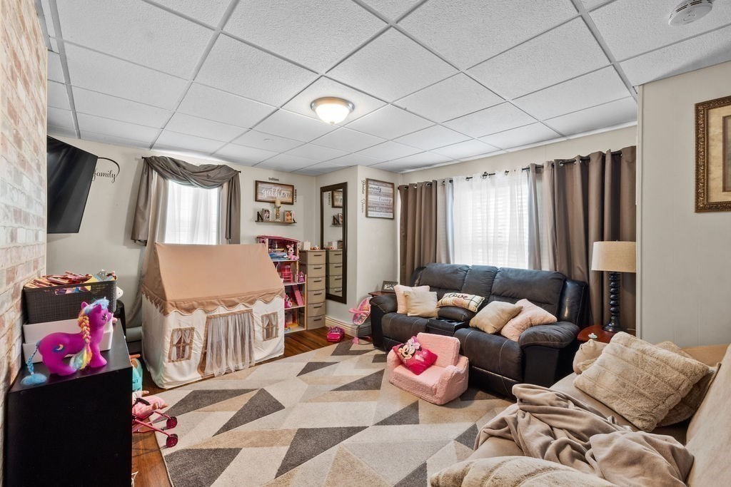 186 John Street Fall River, MA 02721 - Photo 31 of 38 a living room with furniture and a window