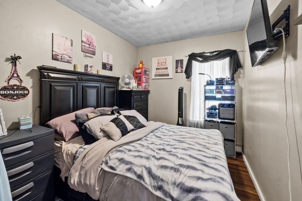 186 John Street Fall River, MA 02721 - Photo 33 of 38 a bedroom with a bed and a dresser