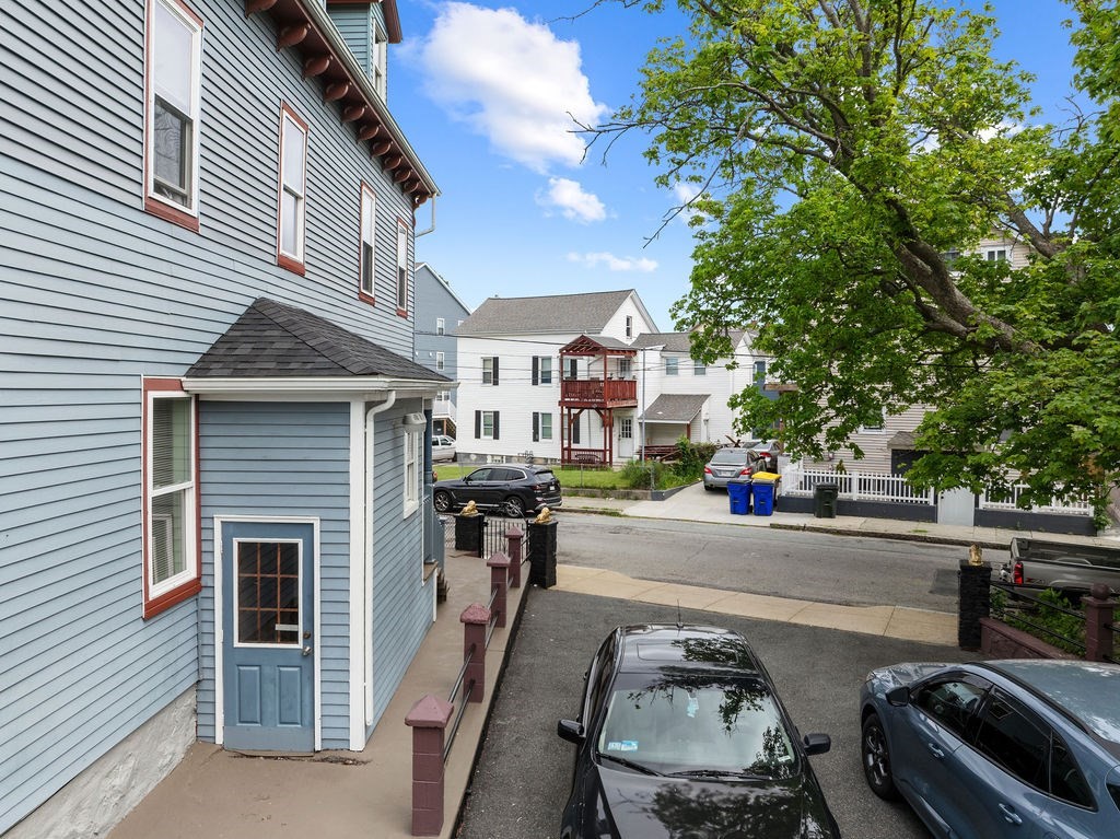 186 John Street Fall River, MA 02721 - Photo 6 of 38 a car parked in front of a house