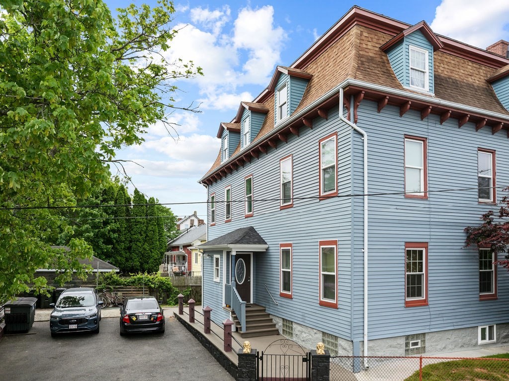 186 John Street Fall River, MA 02721 - Photo 8 of 38 a front view of a house with parking space