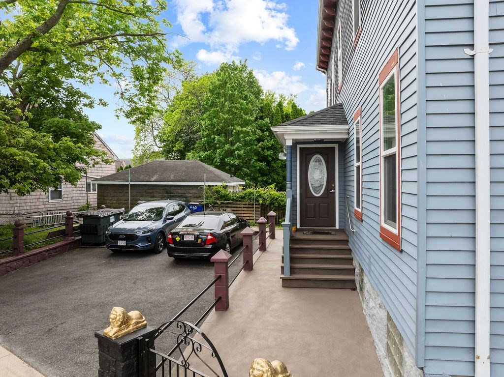 186 John Street Fall River, MA 02721 - Photo 9 of 38 a view of a patio with two chairs and a table