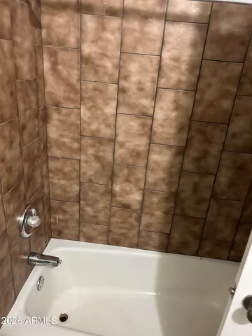 a bathroom with a bathtub